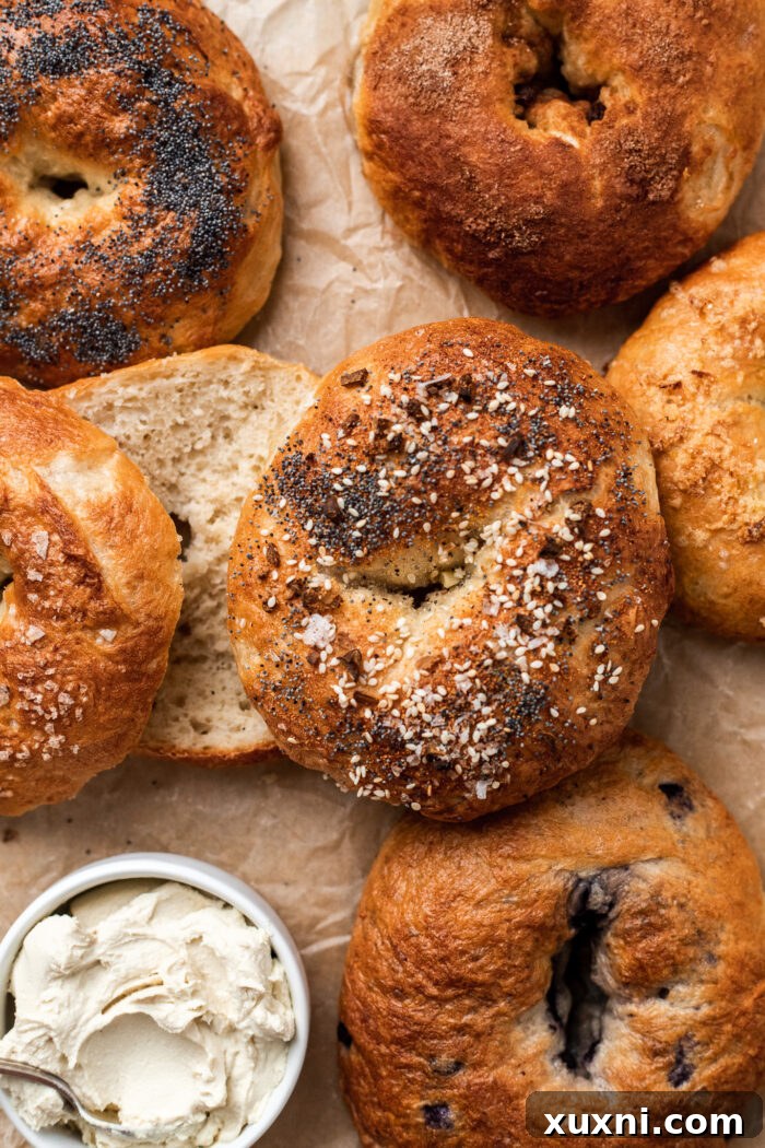 sliced vegan bagels on parchment paper
