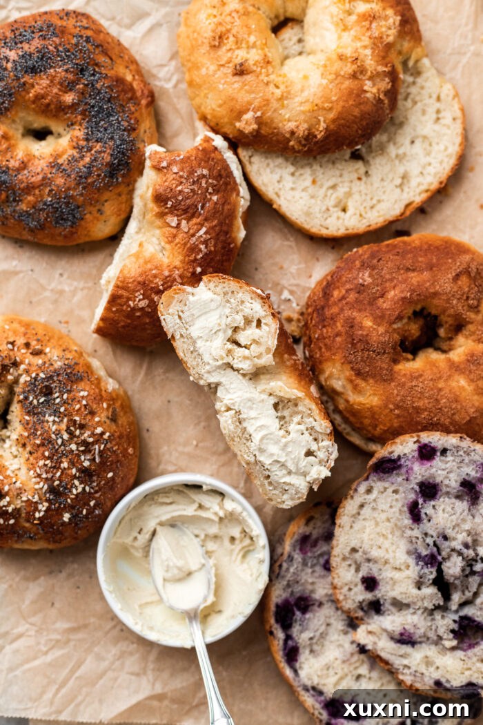 sliced bagels on parchment paper