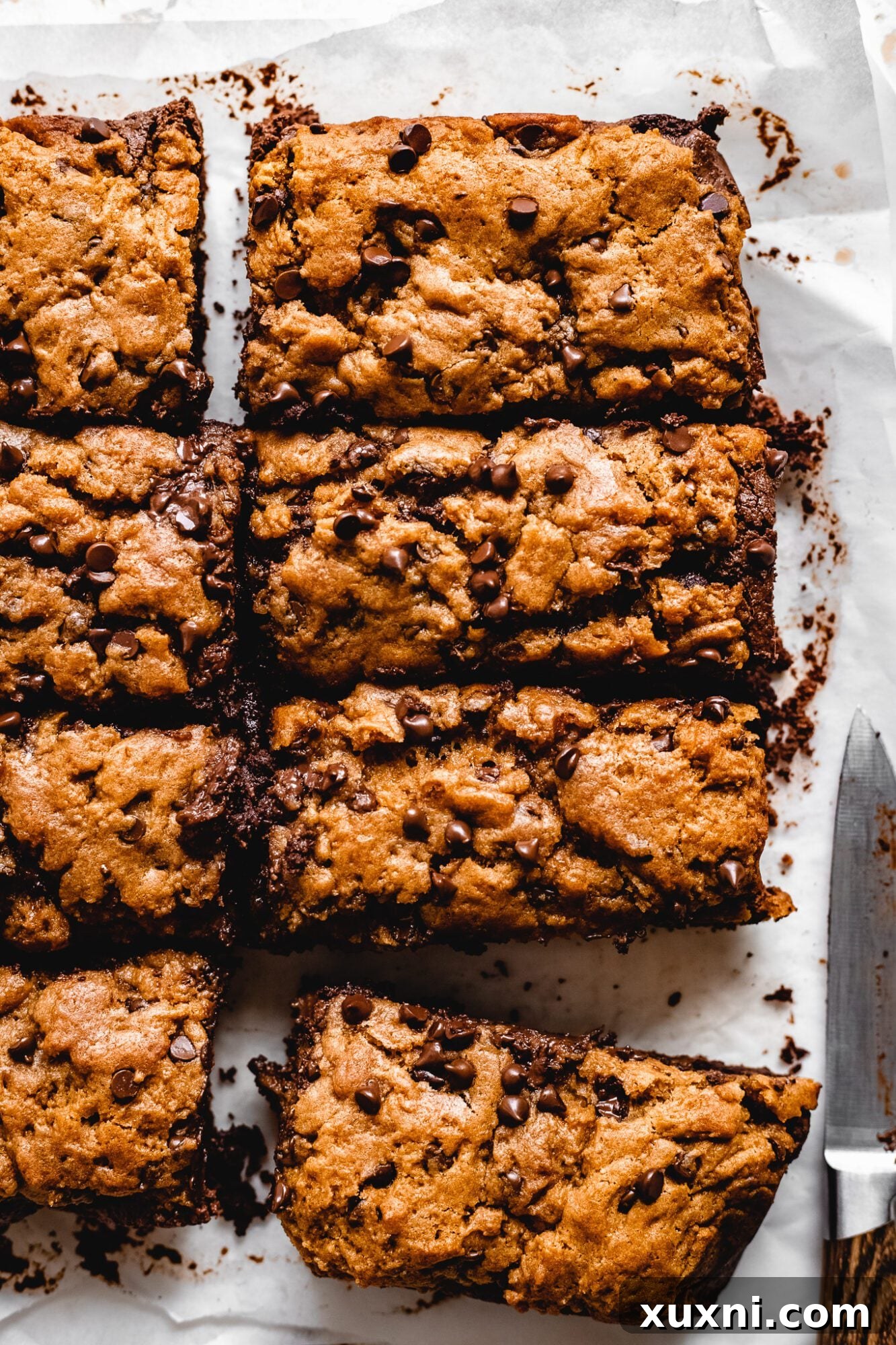 Freshly baked vegan brookie bars, warm and ready for slicing