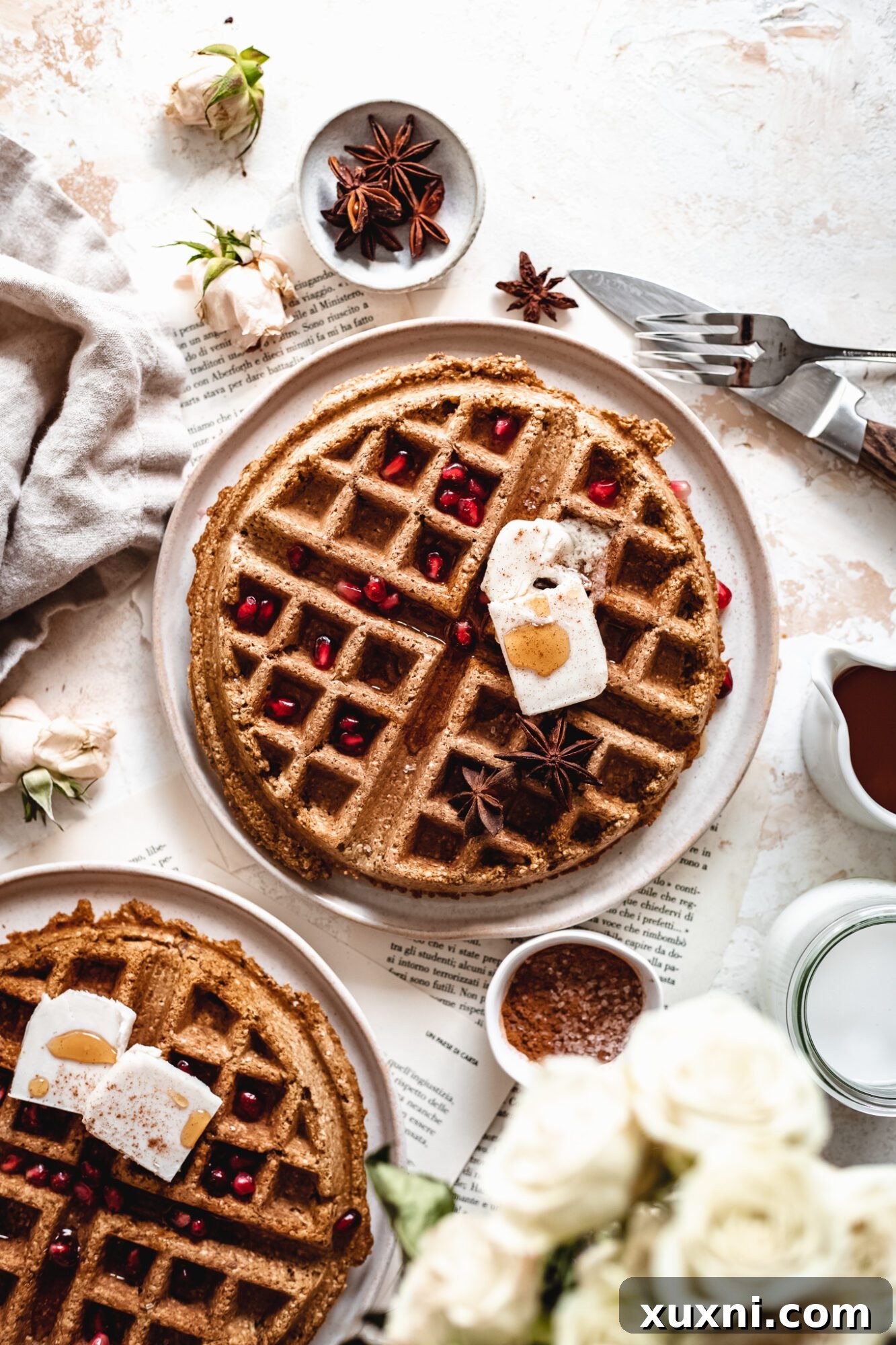 Effortless Gluten Free Vegan Pumpkin Waffles 2 Delightful vegan pumpkin waffles on a plate, ready to be enjoyed