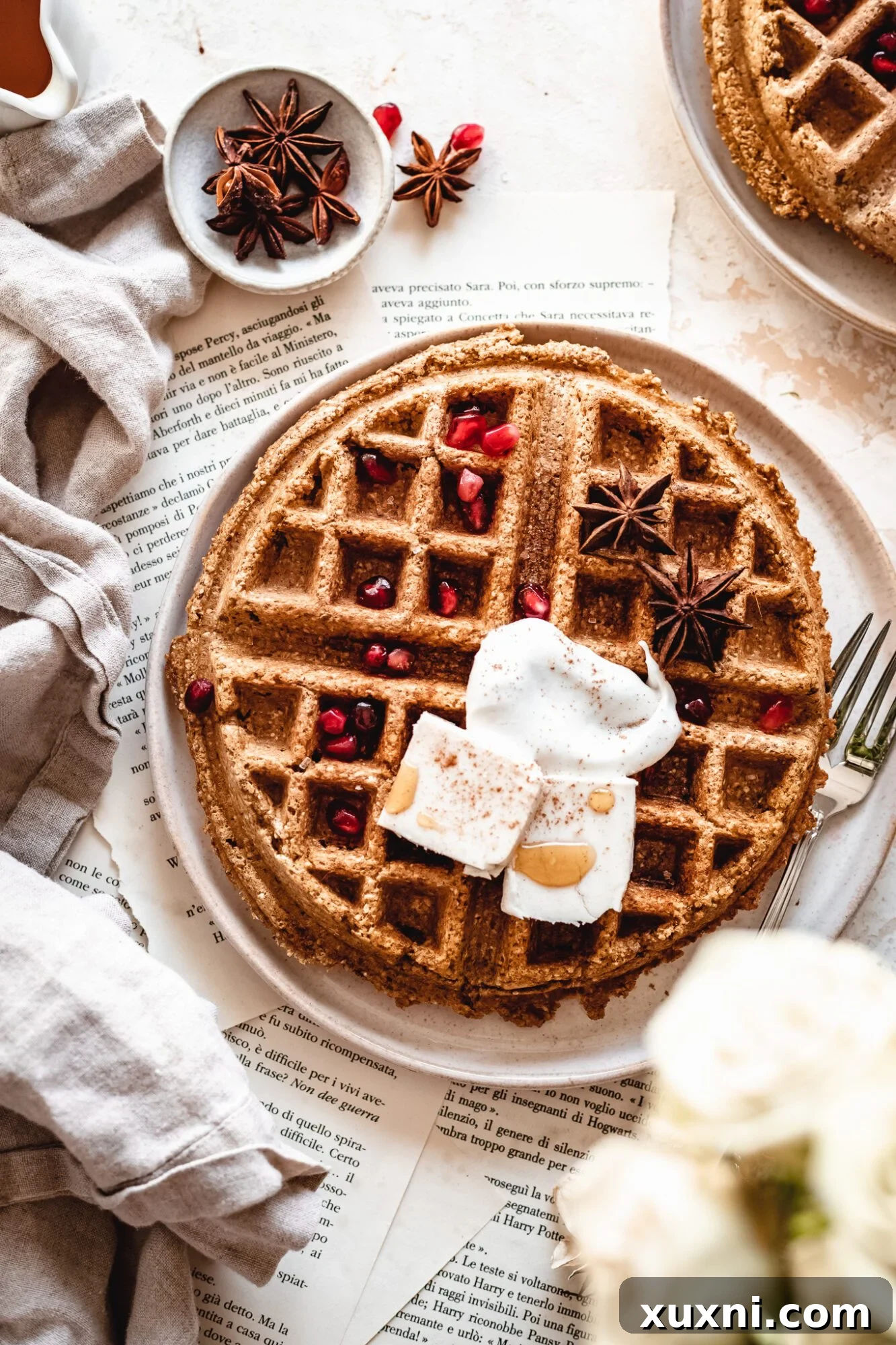 Effortless Gluten Free Vegan Pumpkin Waffles 5 Close-up view of a perfectly cooked vegan pumpkin waffle, showcasing its crispy texture