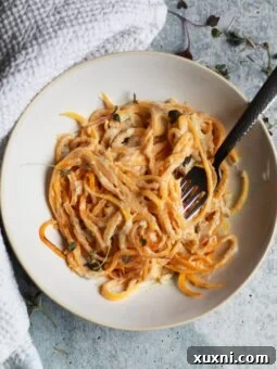 This is the best easy paleo vegan Alfredo sauce and is completely yeast free and Whole30 compliant! It's a family favorite and crowd pleaser!