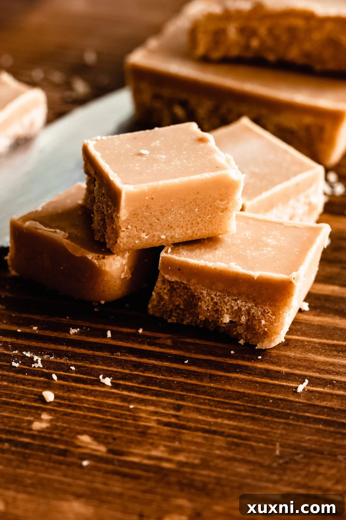 A solid block of homemade vegan white chocolate, showcasing its smooth texture and light color.