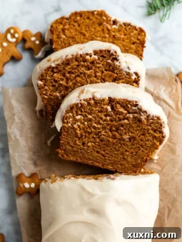 sliced gingerbread loaf cake on a board