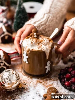 hands holding gingerbread latte