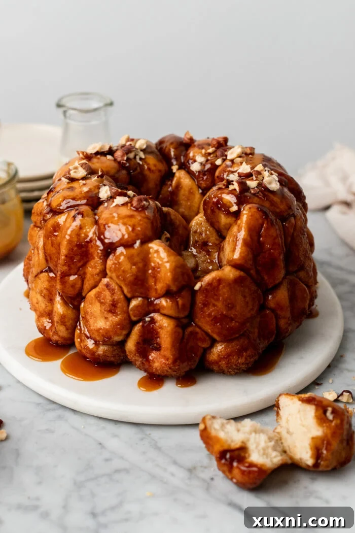 The Ultimate Easy Vegan Pull-Apart Bread 13 Close-up of baked vegan monkey bread, golden brown and puffed.
