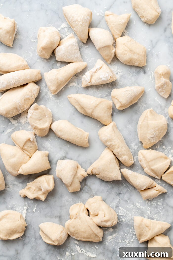 The Ultimate Easy Vegan Pull-Apart Bread 6 Each quarter of monkey bread dough further divided into smaller pieces.