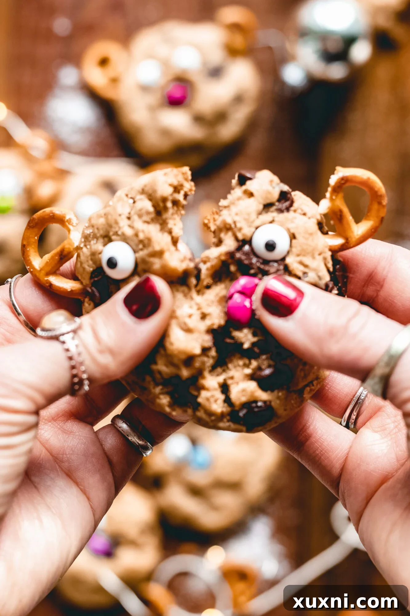 Whip Up Whimsical Reindeer Cookies 7 hand breaking up cookie
