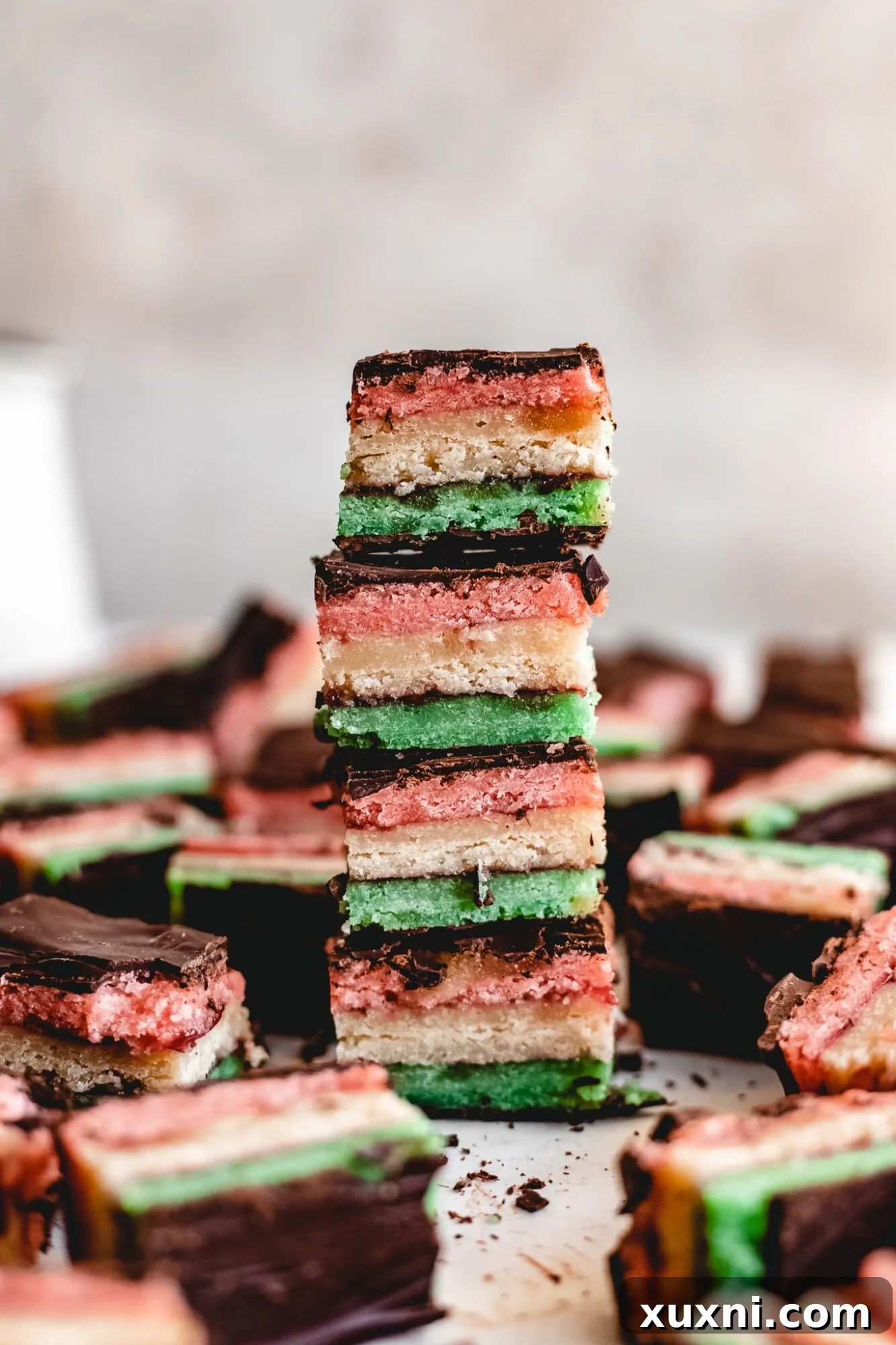Stacked Italian tricolor cookies showcasing their vibrant layers.