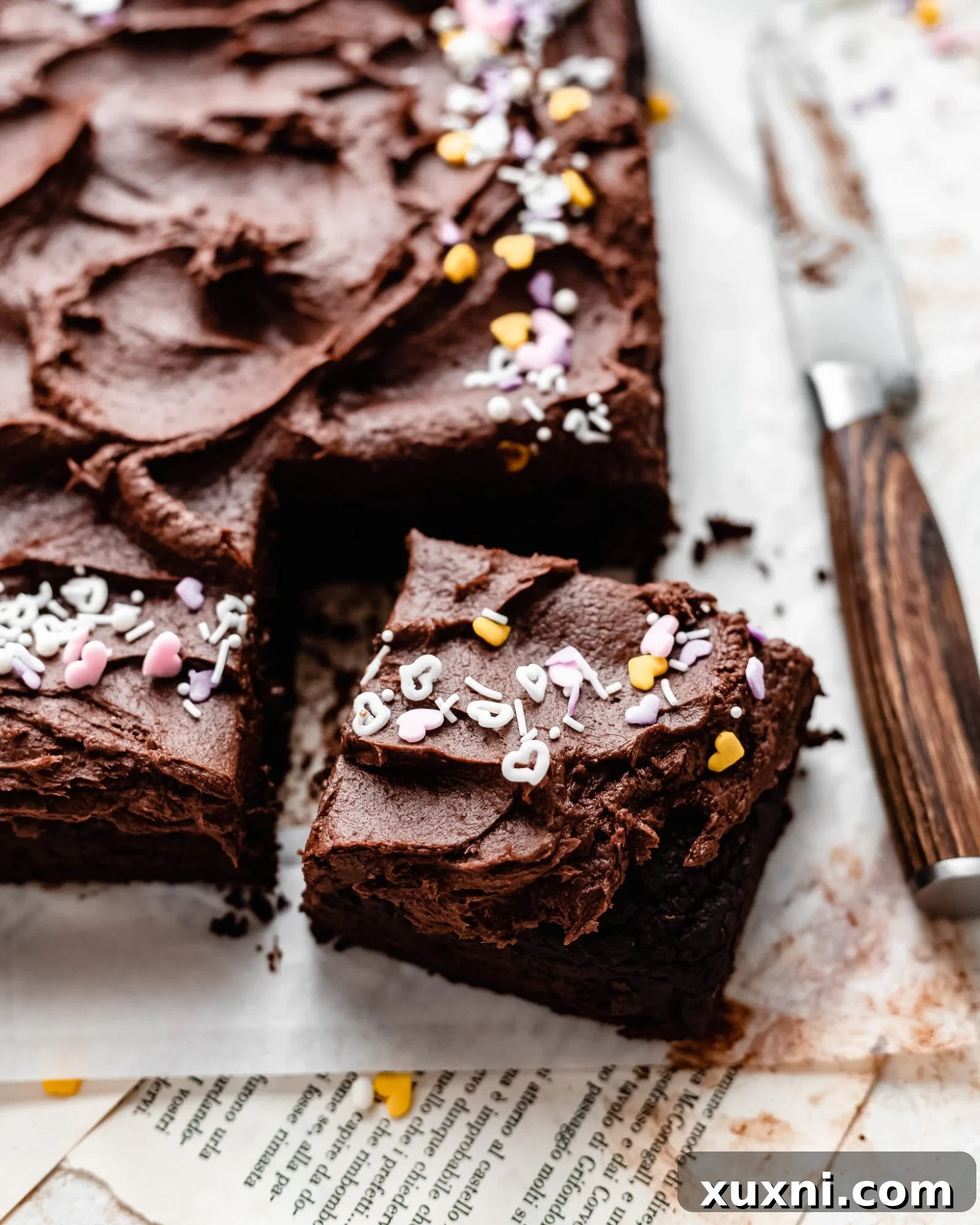 A delectable slice of vegan chocolate sheet cake presented beautifully.