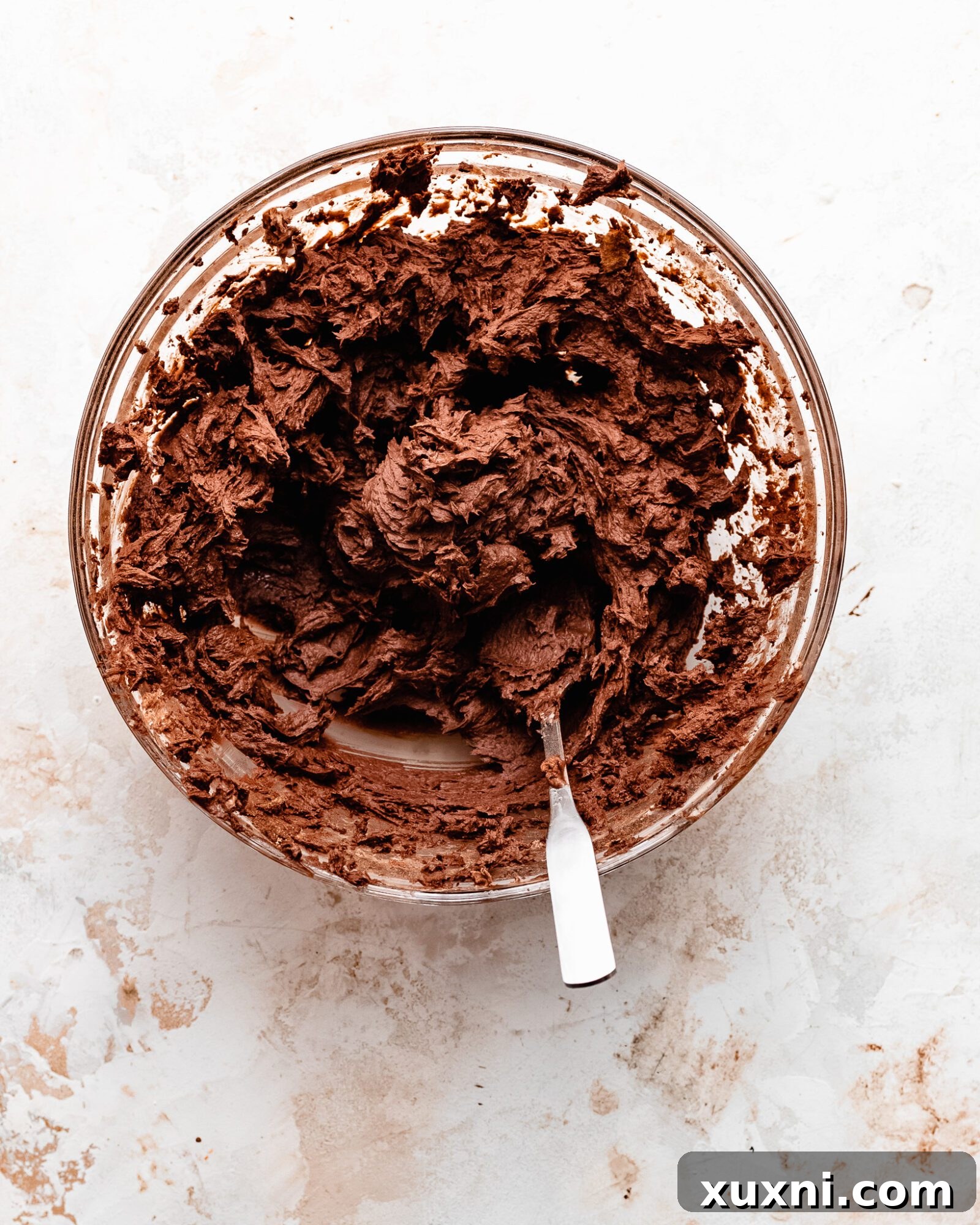 Close-up of fluffy vegan chocolate buttercream, ready to be spread.