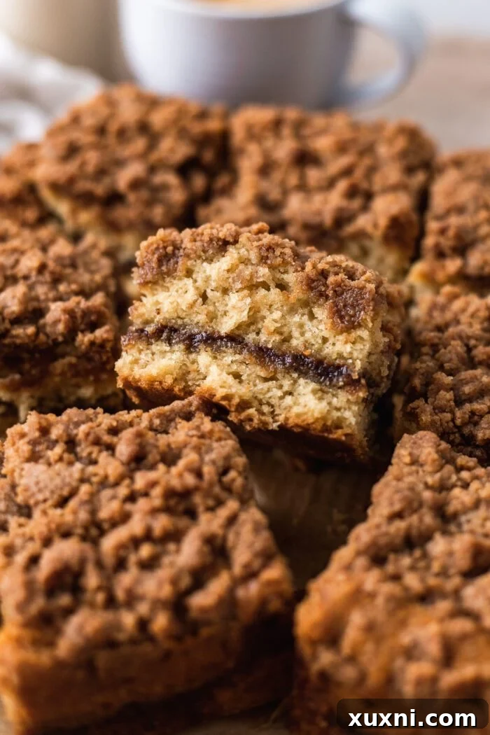 vegan sliced coffee cake cooling on parchment paper