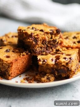 Chocolate Chip Cookie Bars | This gluten-free dessert recipe is a dream come true for chocolate chip cookie lovers, especially if you’re also trying to eat healthy and stick to healthy desserts. | The Banana Diaries #thebananadiaries #glutenfree #refinedsugarfree #glutenfreedessert #chocolatechipcookies #chocolatechip #healthydessert