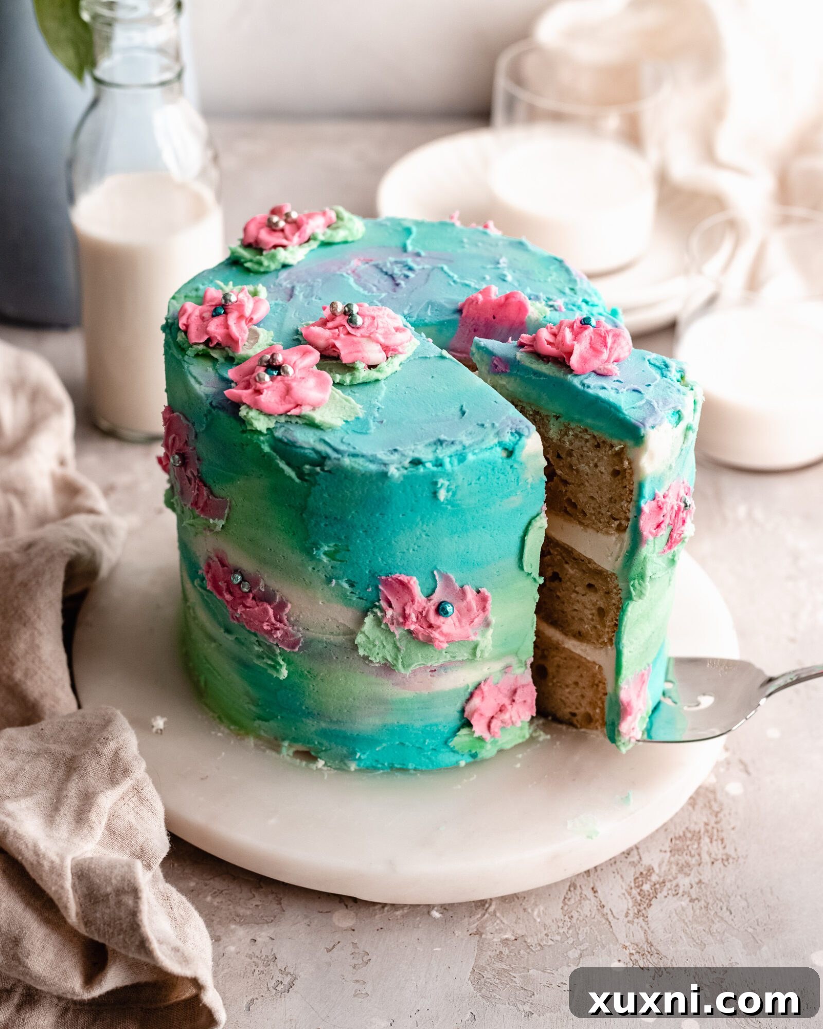 sliced vegan watercolor cake