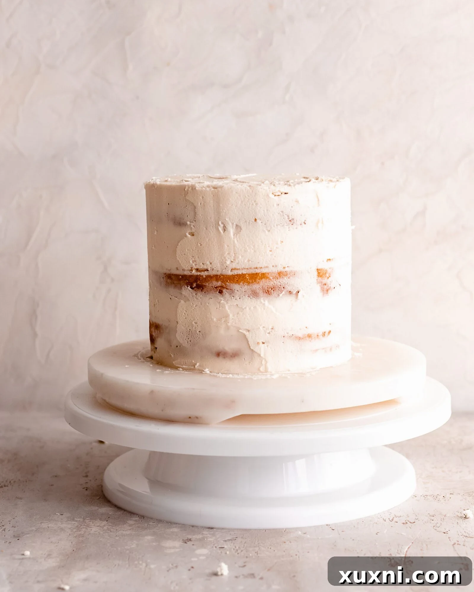 crumb coating a cake