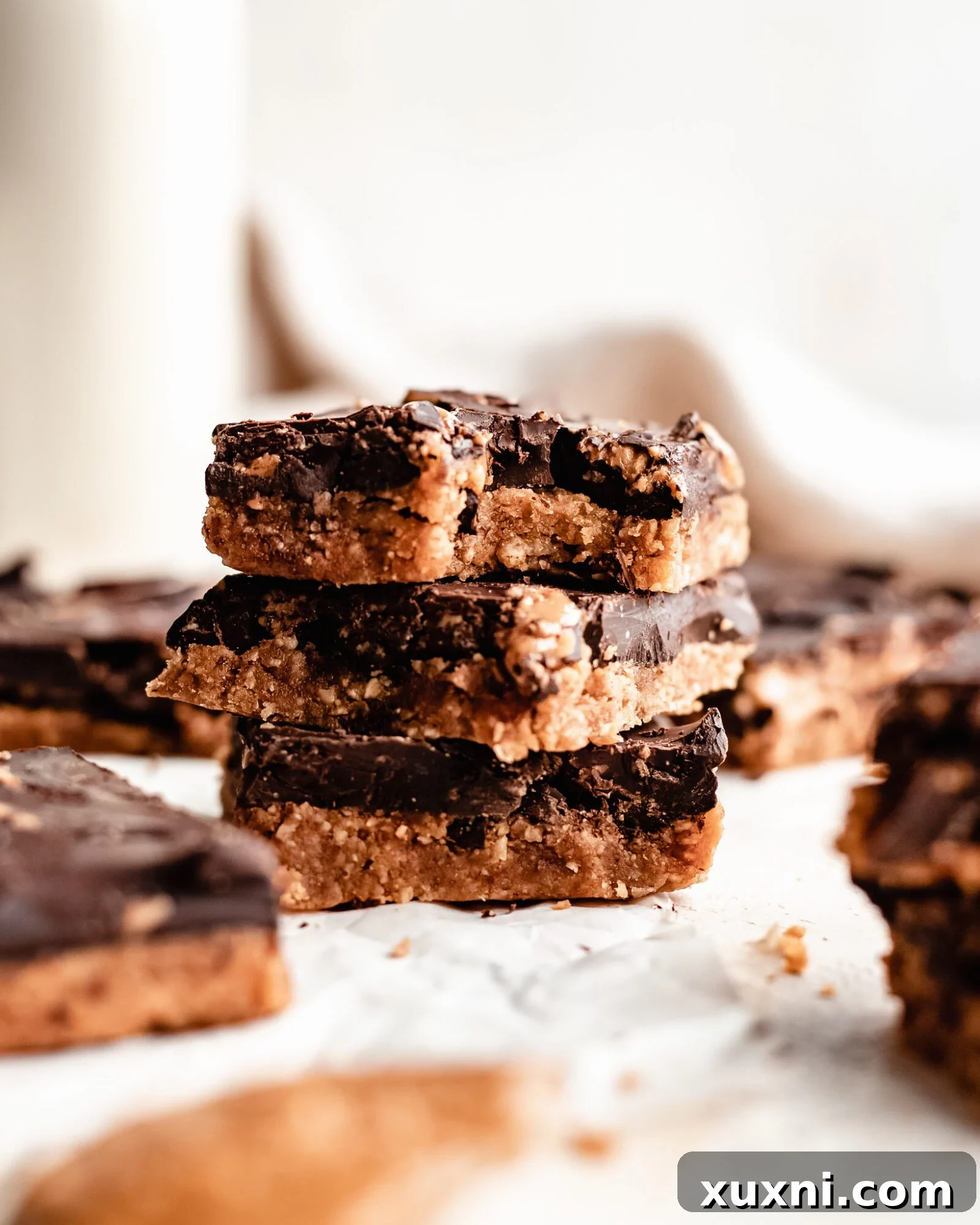 stacked no bake chocolate peanut butter bars