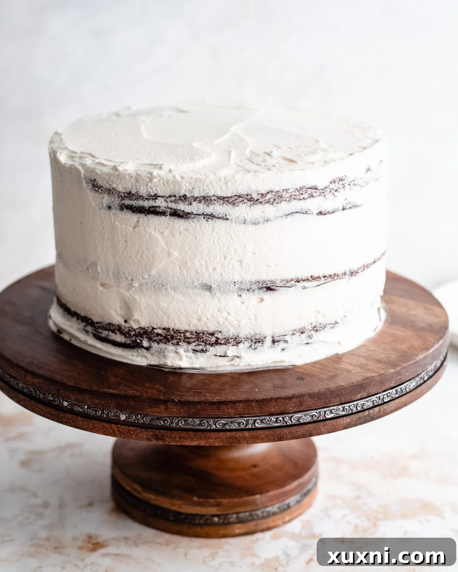 using the coconut cream as a whipped cream frosting on a vegan dessert