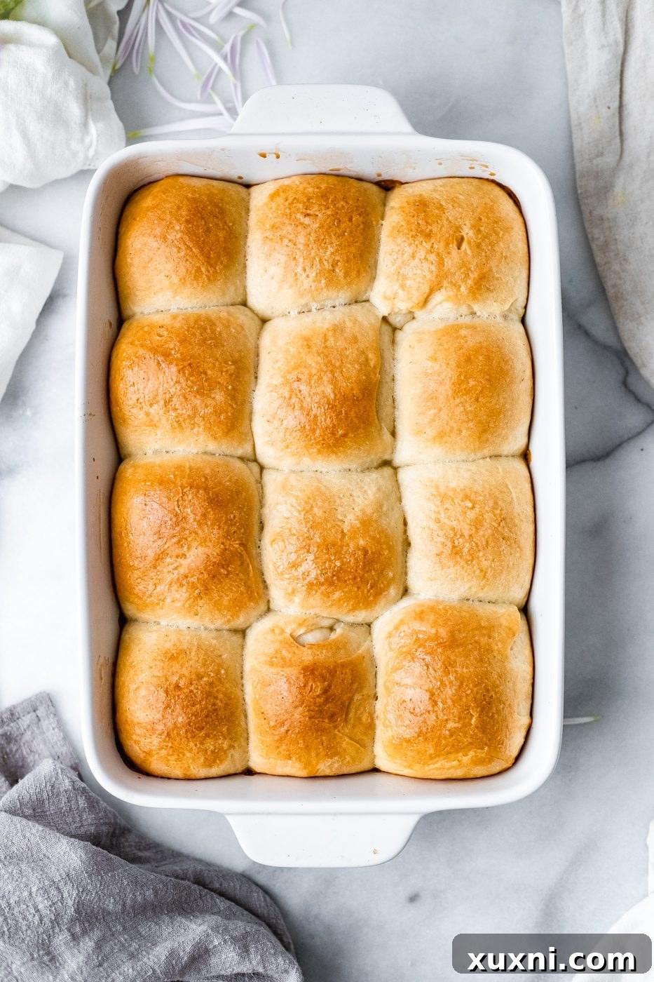 baked golden brown vegan dinner rolls fresh out of the oven