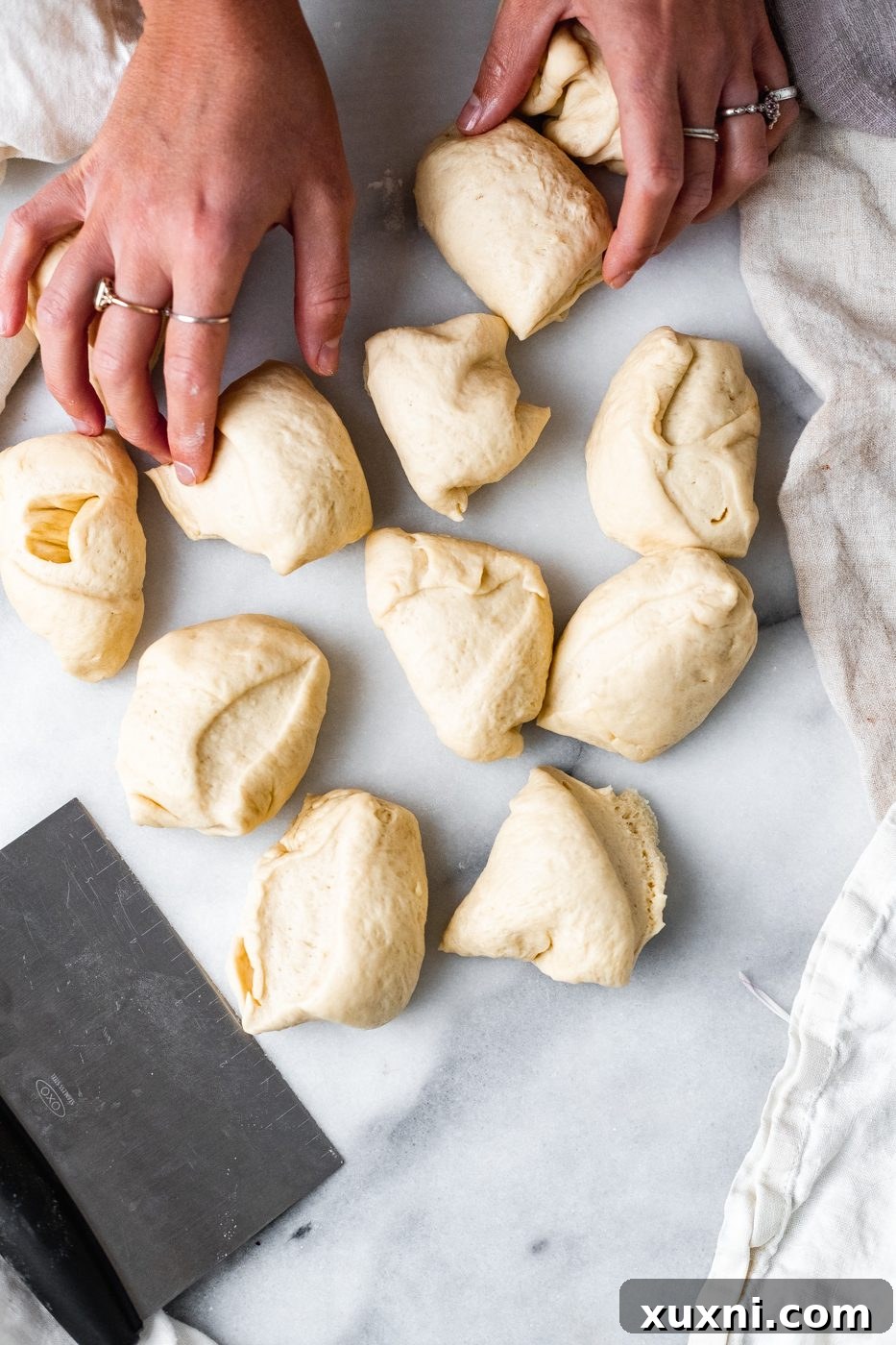 vegan dinner roll dough divided into 12 balls for shaping