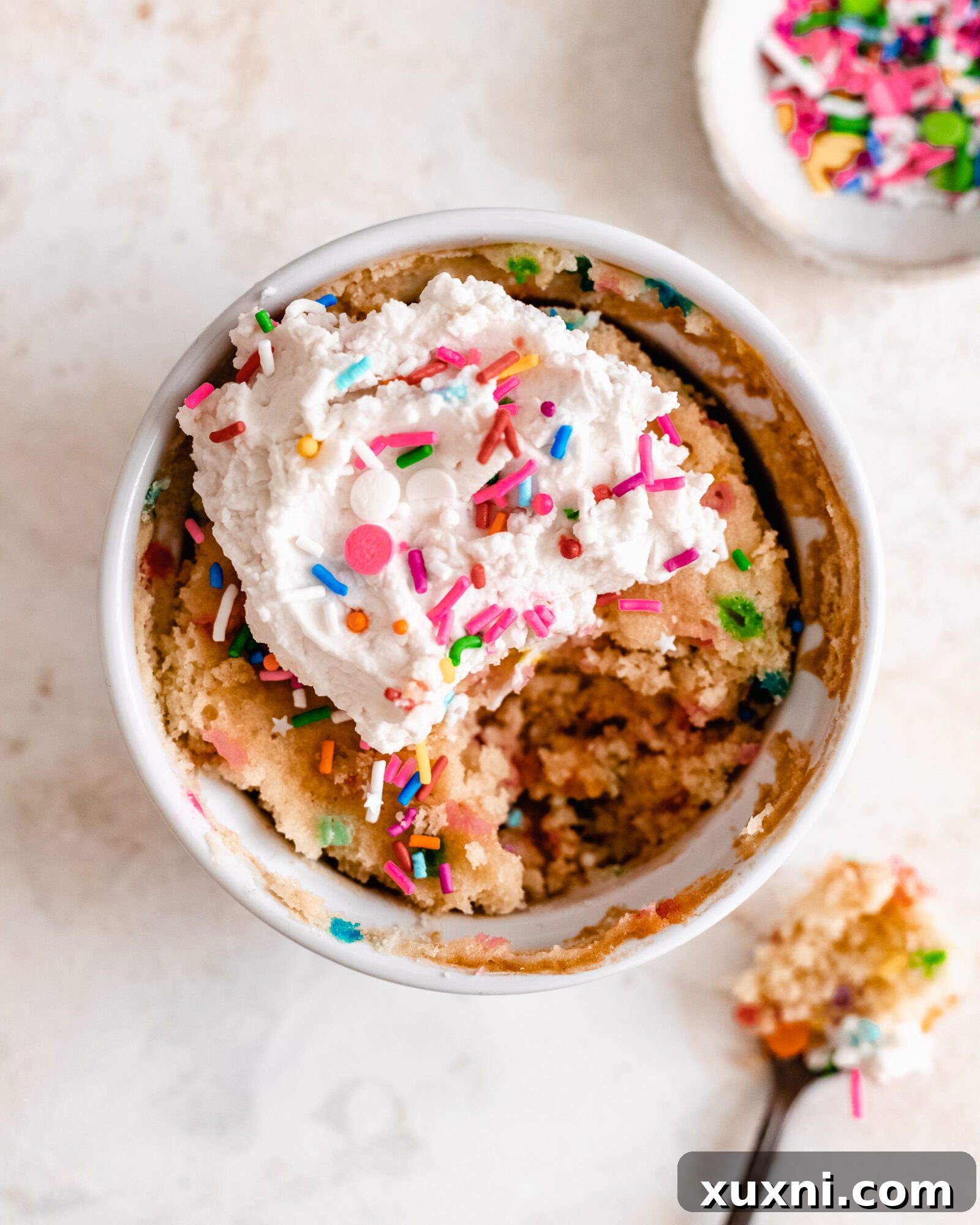 funfetti mug cake with extra sprinkles