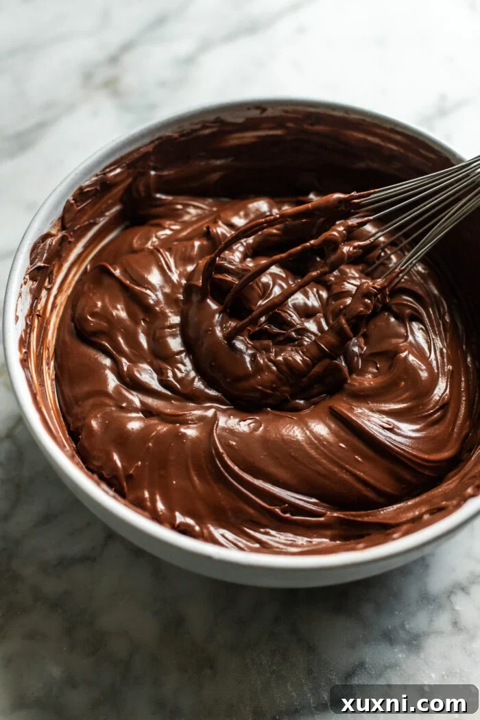 Vegan chocolate ganache frosting being prepared