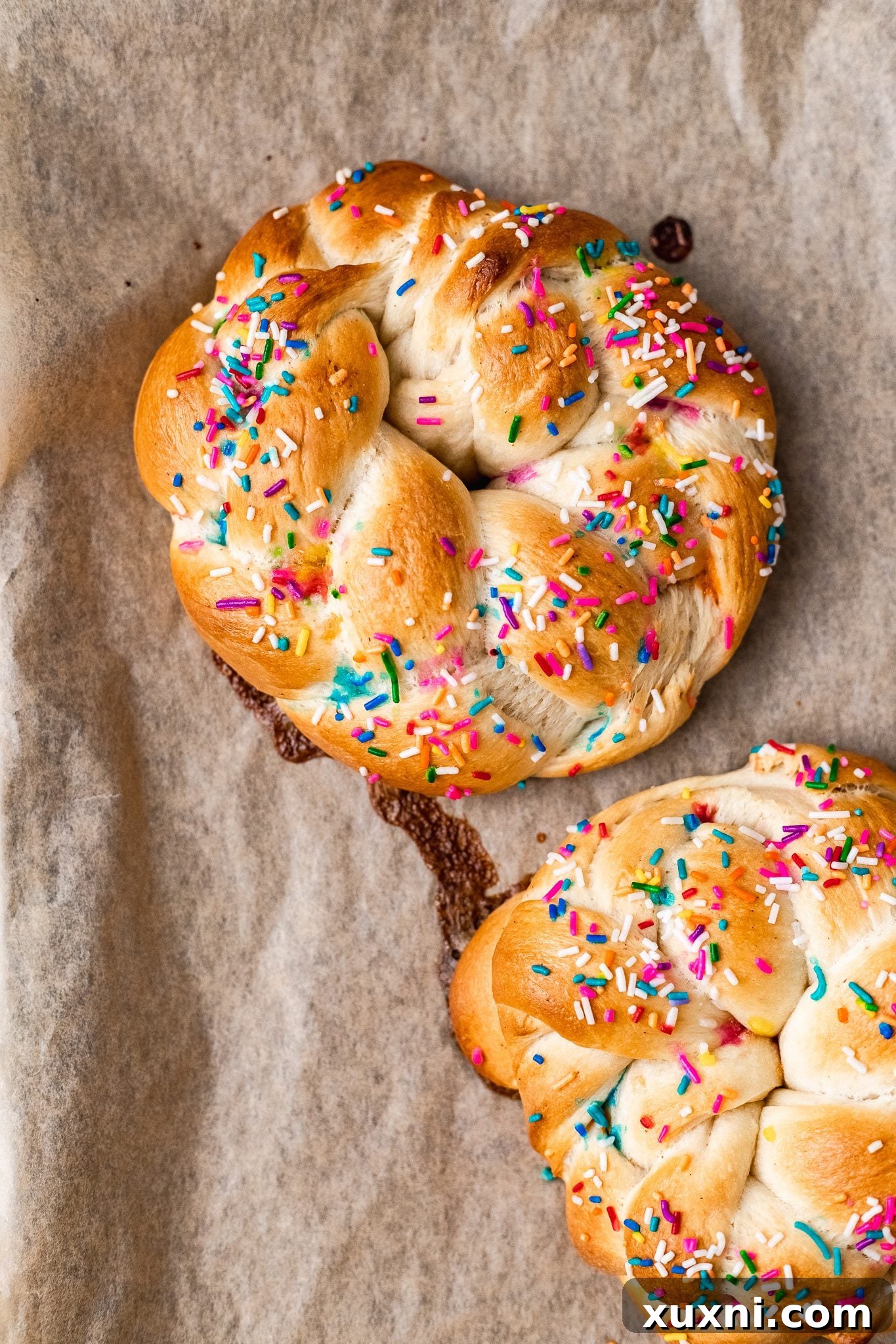 Freshly baked vegan Easter bread, golden and fragrant, cooling on a rack right out of the oven.