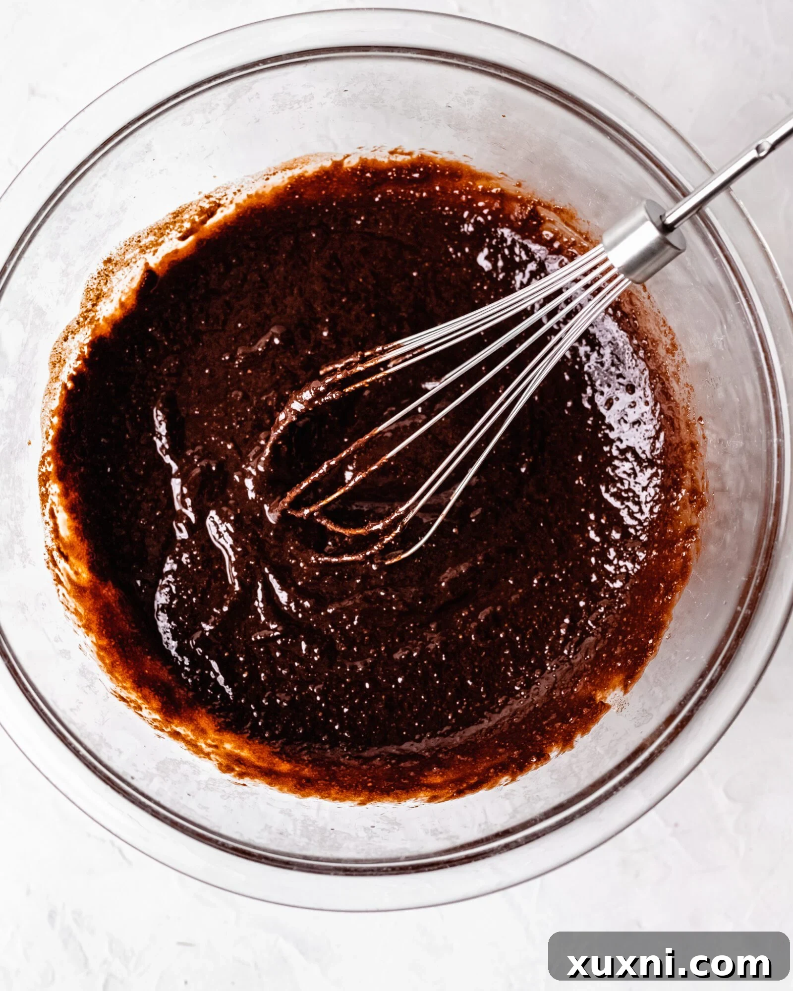 hand mixing brownie batter