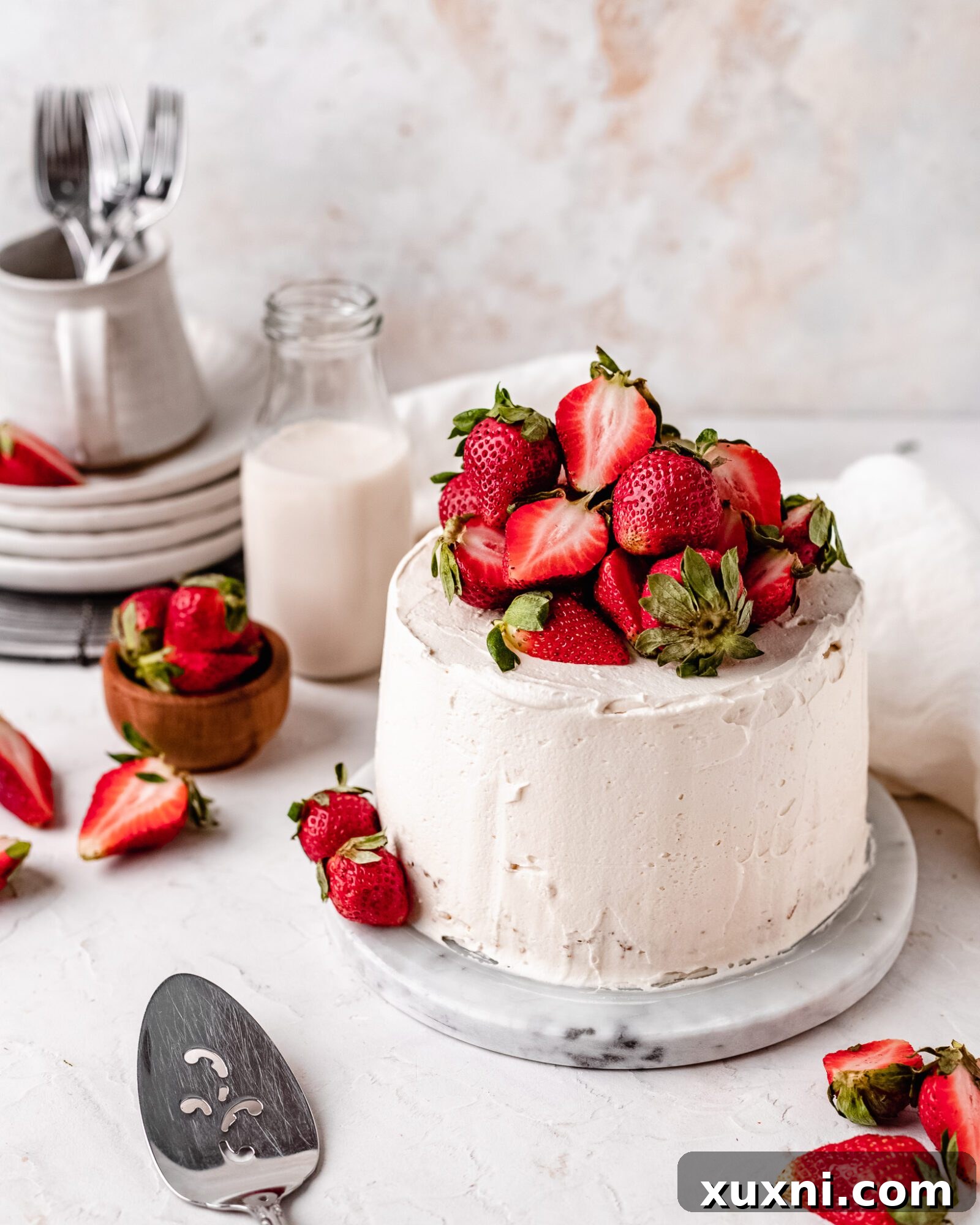 Close-up of vegan chiffon cake batter in a bowl, showcasing its light and airy texture before baking.