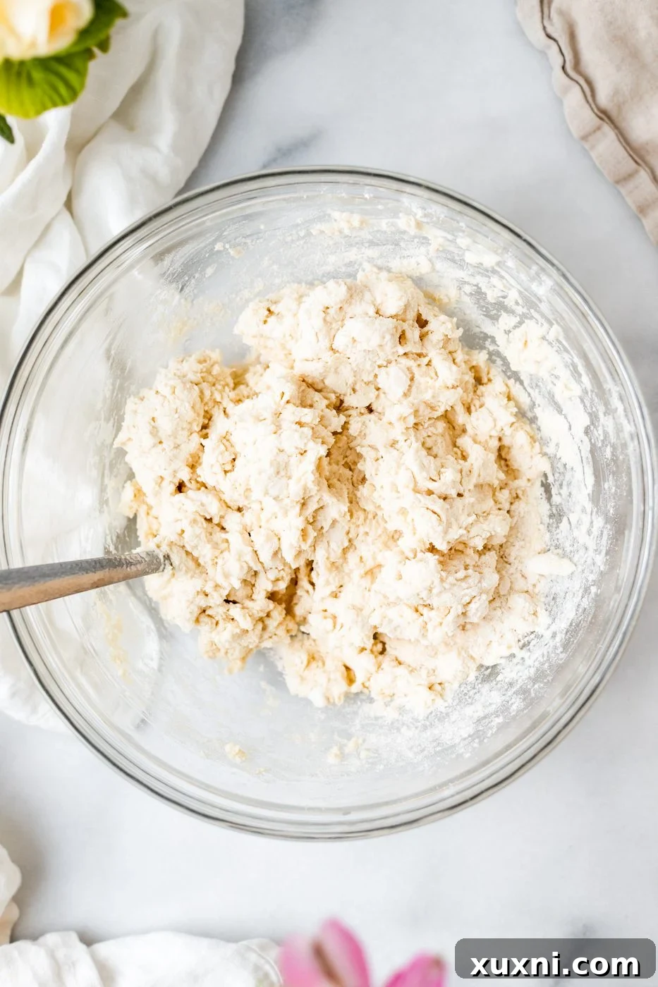 shaggy vegan biscuit dough mixed with buttermilk