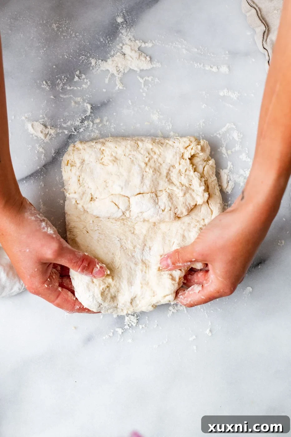 folding the biscuit dough like a letter for lamination