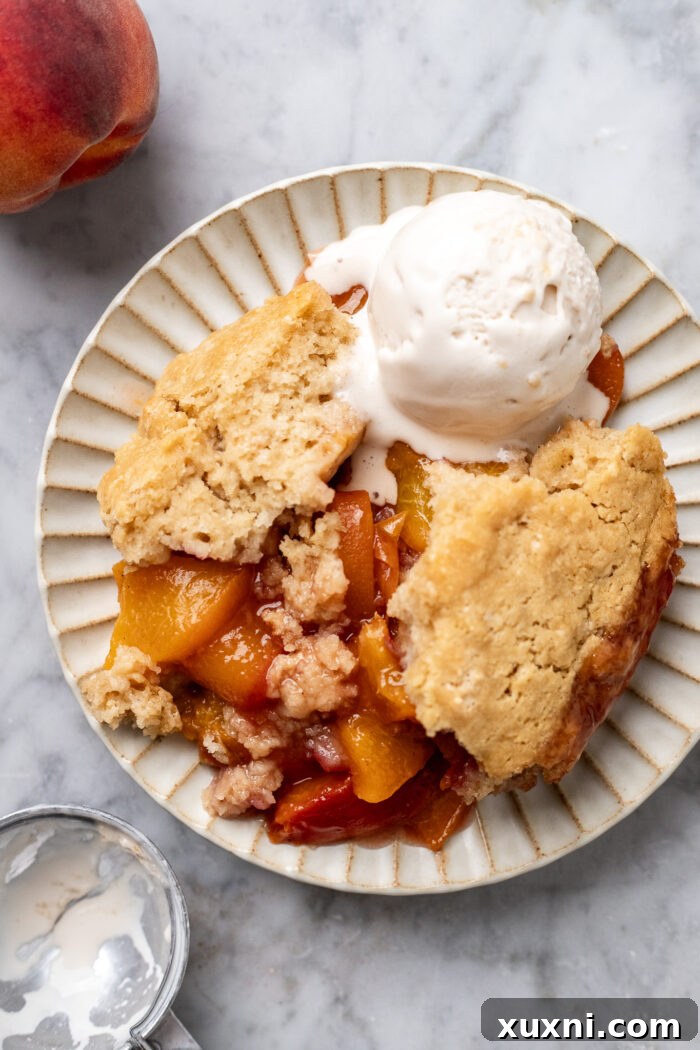 plate of roasted vegan peach cobbler
