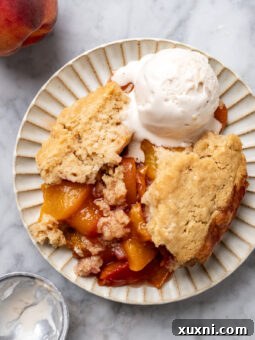 plate of roasted vegan peach cobbler