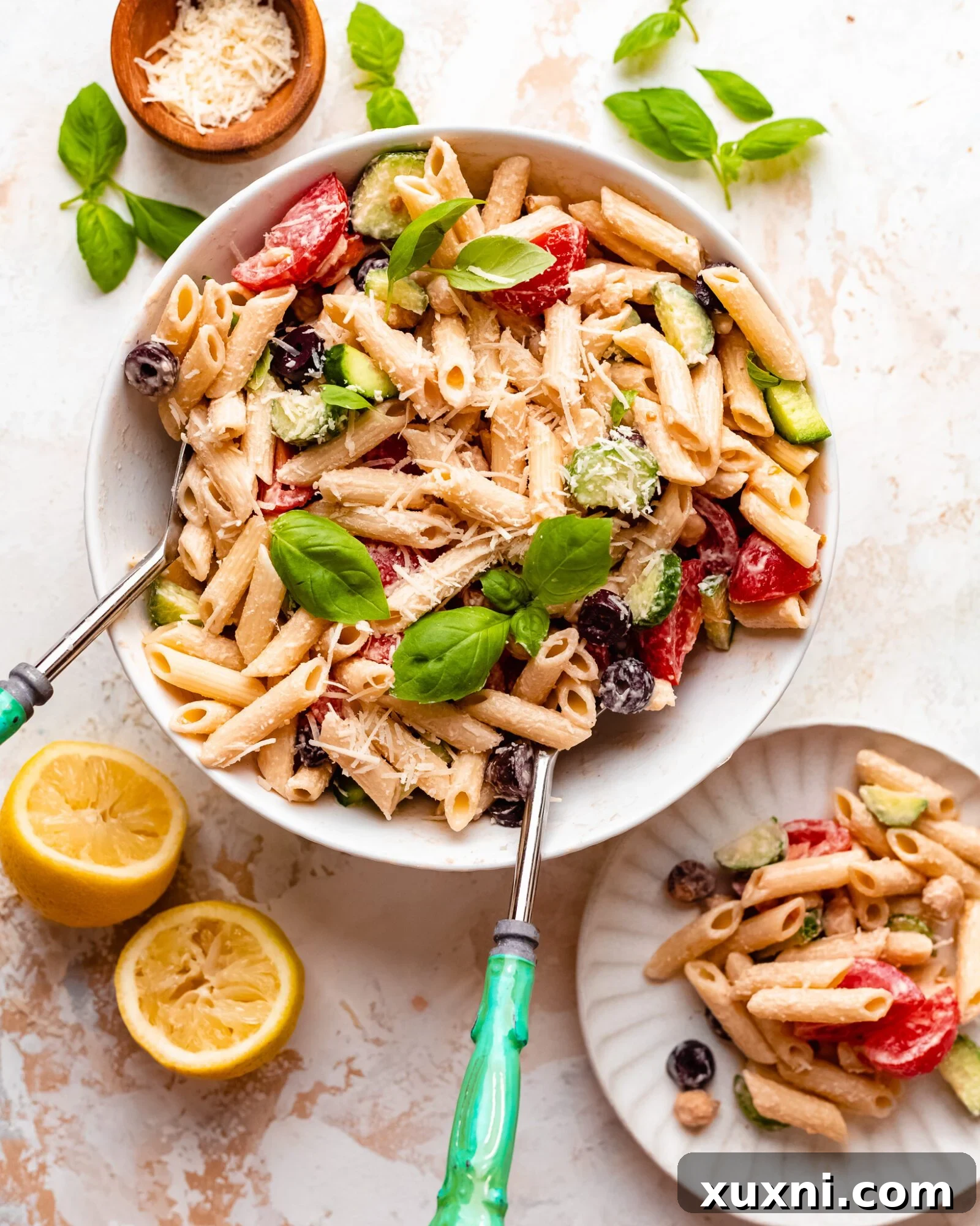 creamy pasta salad - A close-up shot of the creamy vegan pasta salad, showcasing its rich texture and colorful ingredients.
