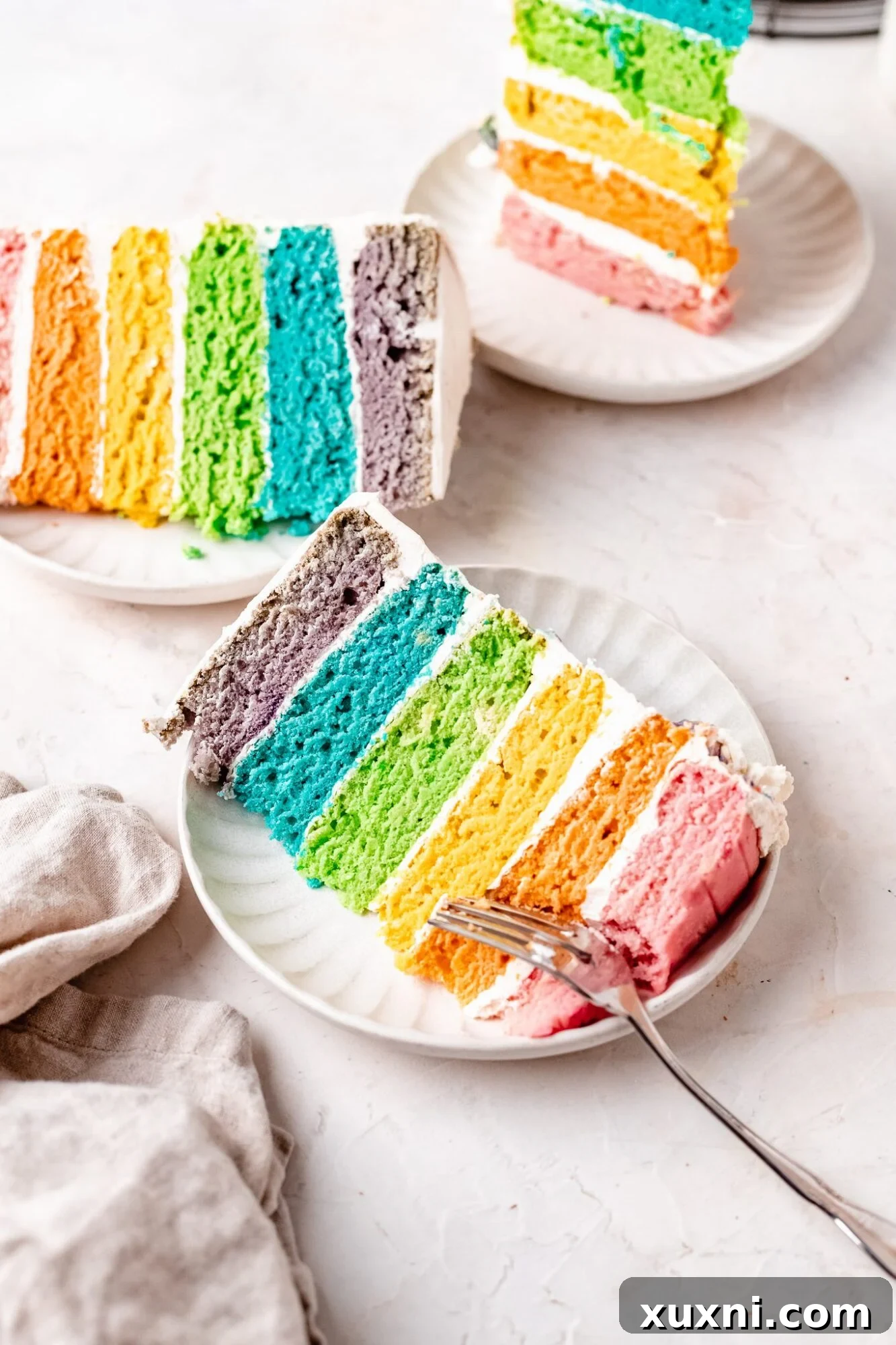 sliced rainbow cake