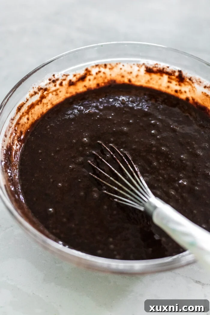 mixing the chocolate cake batter