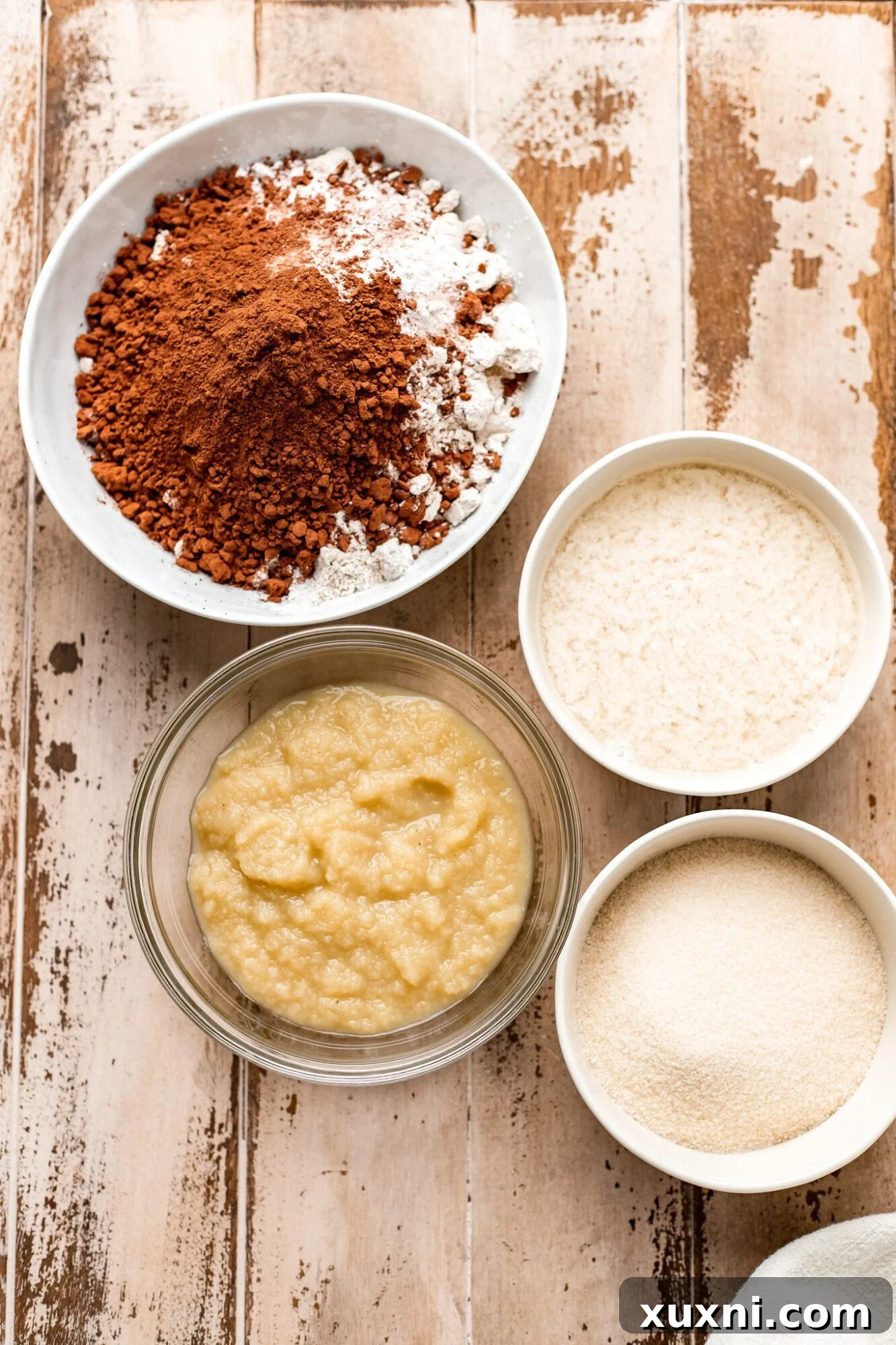 Irresistible Vegan Gluten-Free Chocolate Oat Cake 4 Vegan gluten-free chocolate cake ingredients laid out for baking.