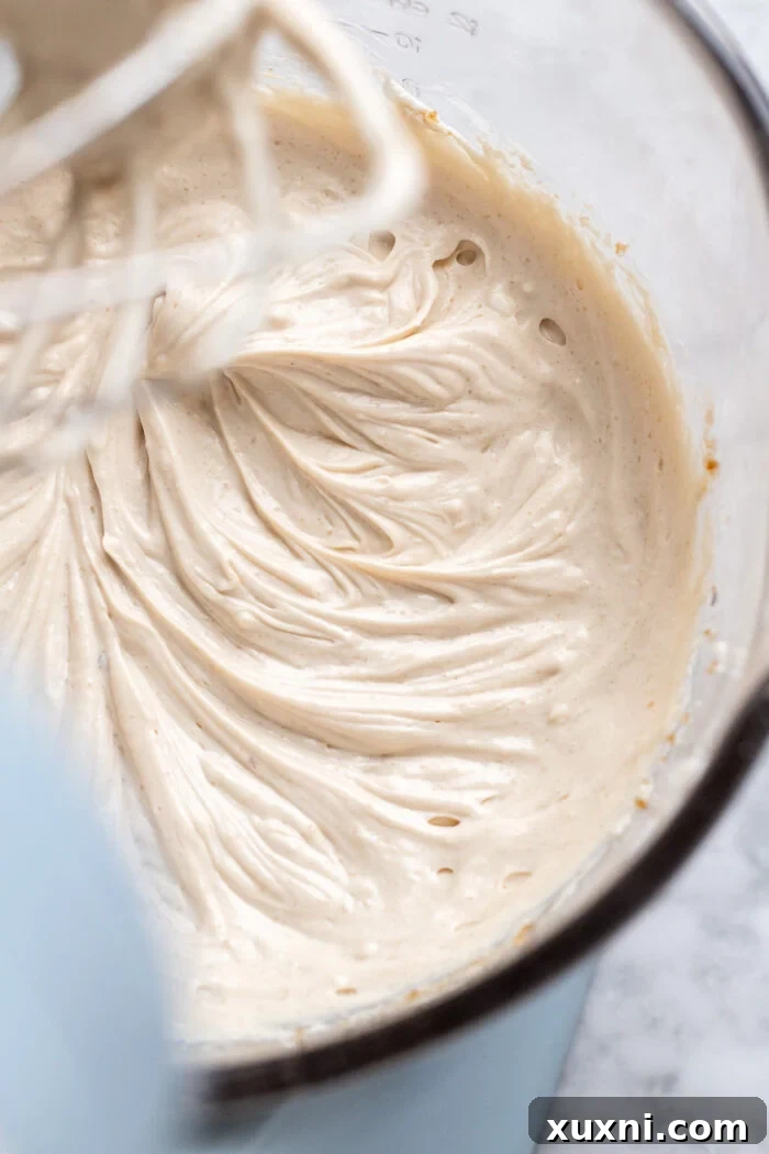Cheesecake filling before chocolate is added, showing its light and fluffy texture