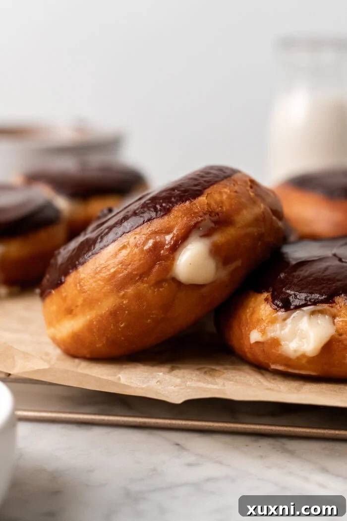 Decadent and Easy Vegan Boston Cream Doughnuts 17 dipped doughnut