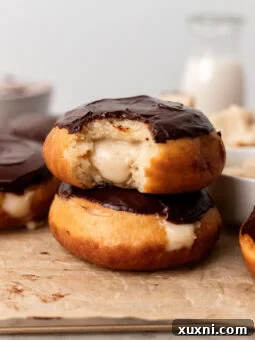 stacked vegan Boston cream donuts