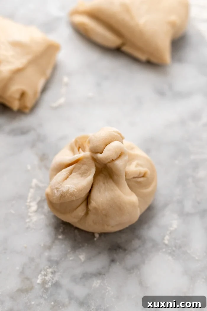 Decadent and Easy Vegan Boston Cream Doughnuts 8 pinched dough