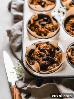 Paleo chocolate chip banana muffin ready to be enjoyed.