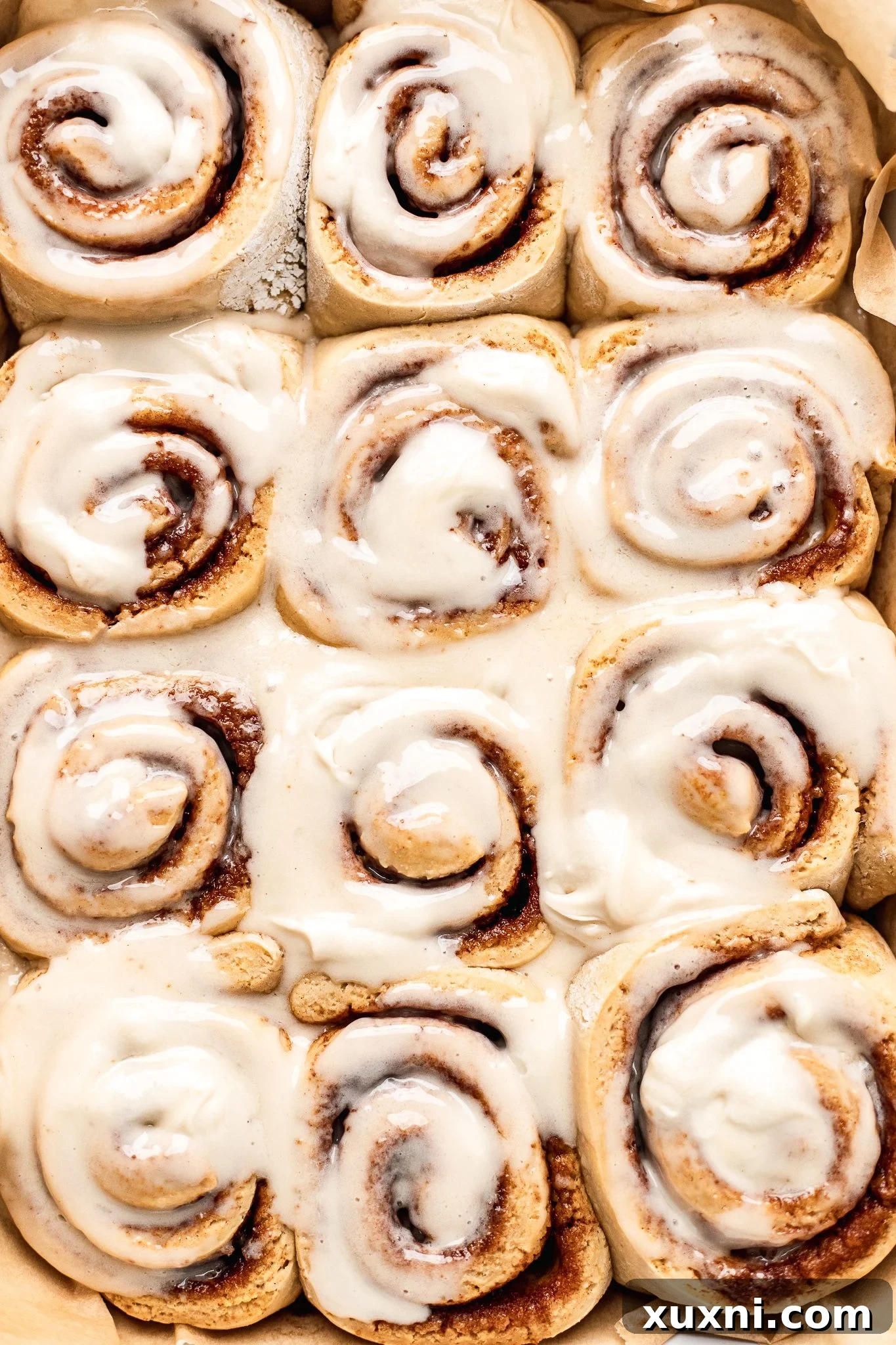 cinnamon rolls with icing on them