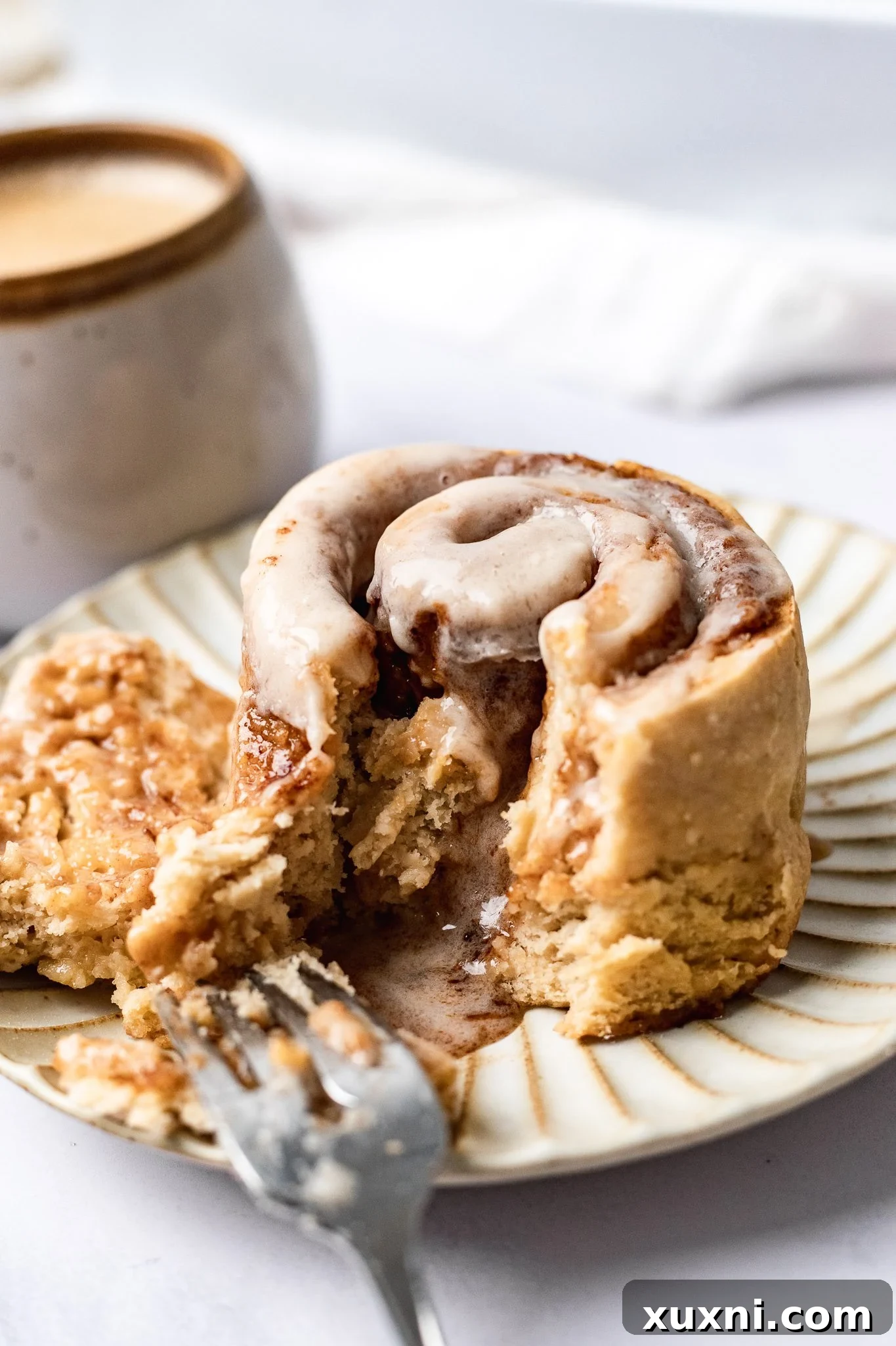 bite taken from cinnamon roll