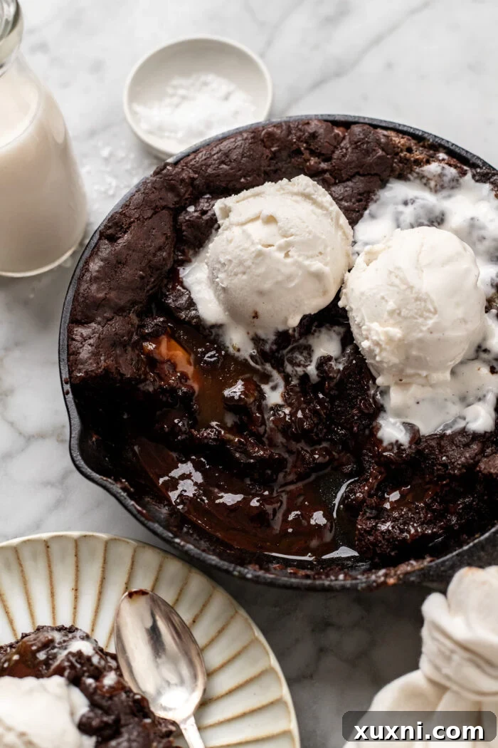 Caramel cookie skillet with vegan ice cream on top, ready to be served