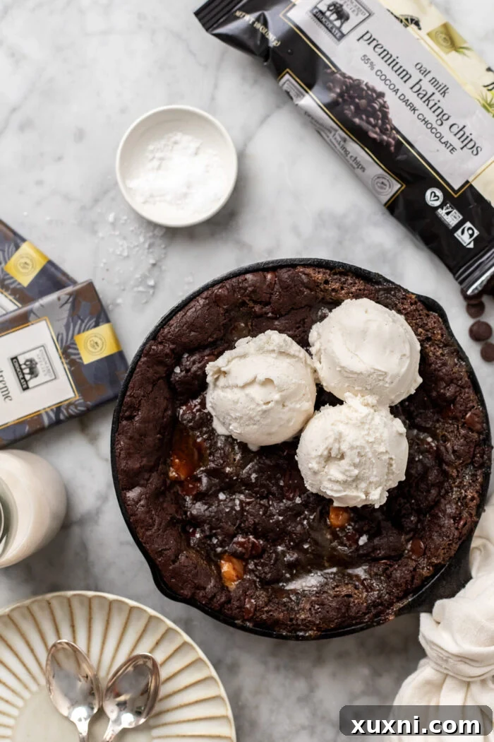 Baked caramel cookie skillet on a marble countertop