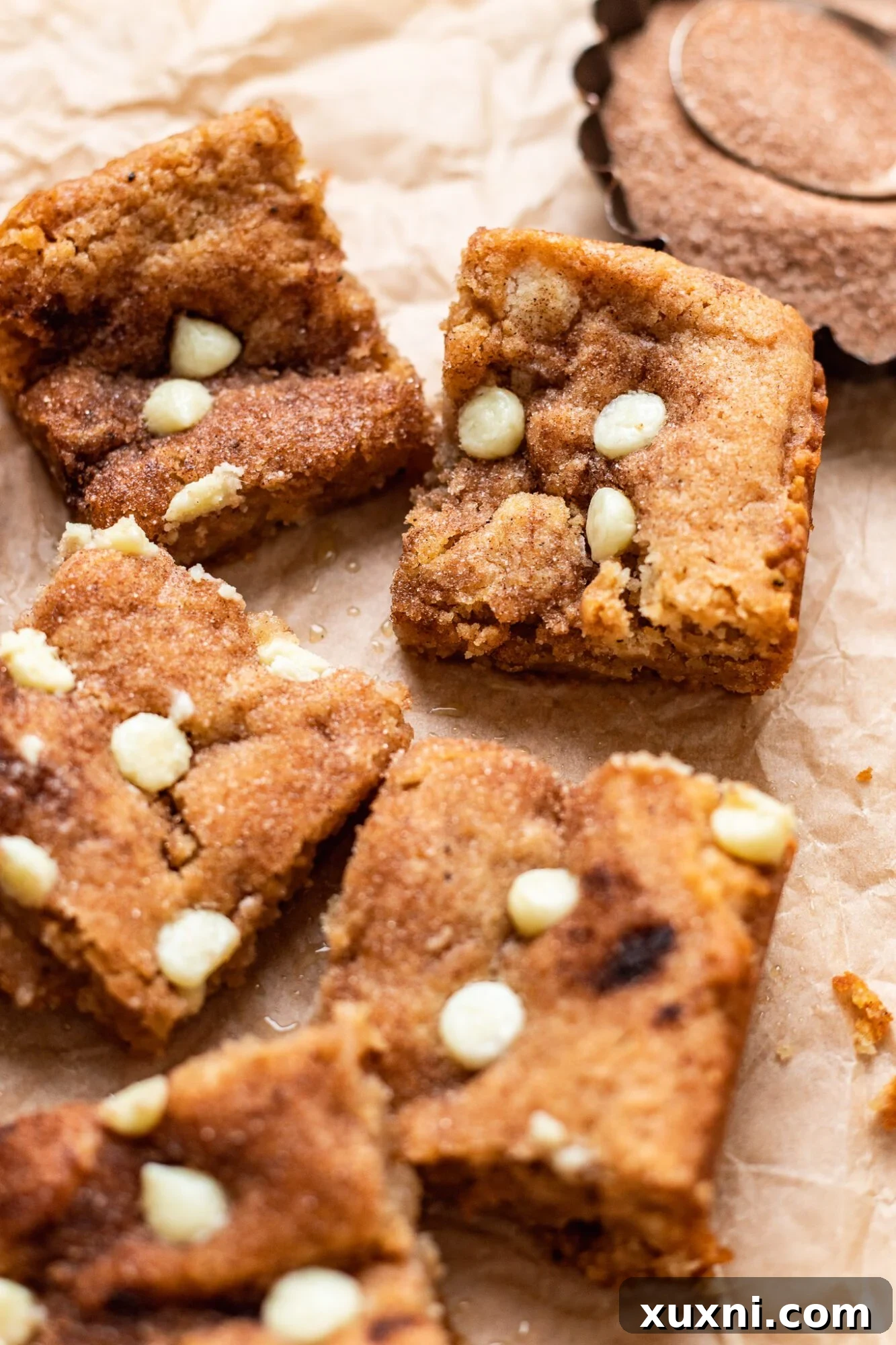 Sliced Vegan Snickerdoodle Blondies on a board