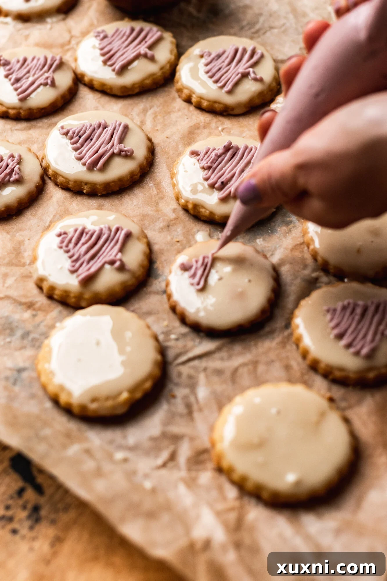 Vegan shortbread cookie dipped in white royal icing