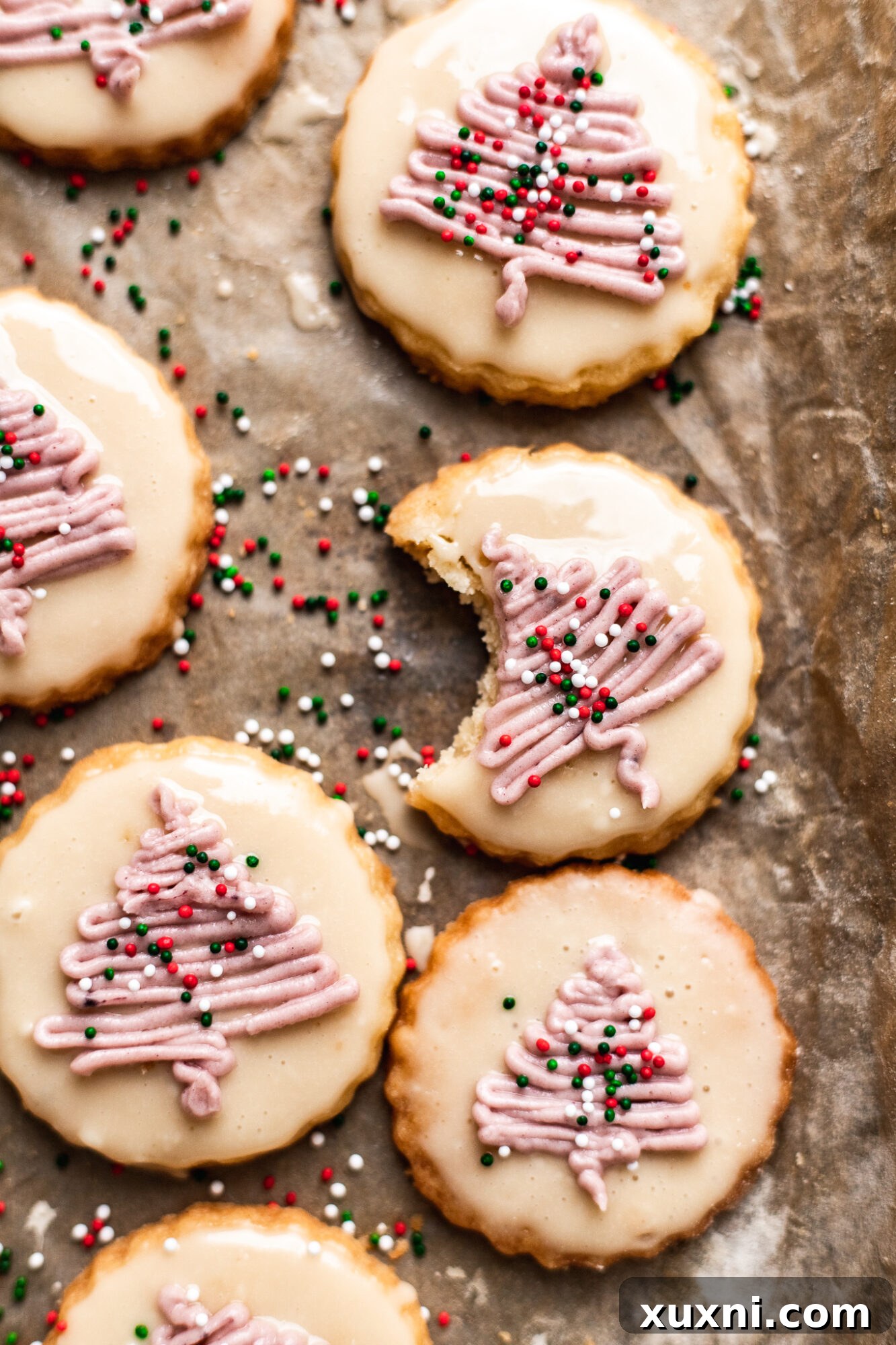 Beautifully decorated vegan Christmas shortbread cookies stacked