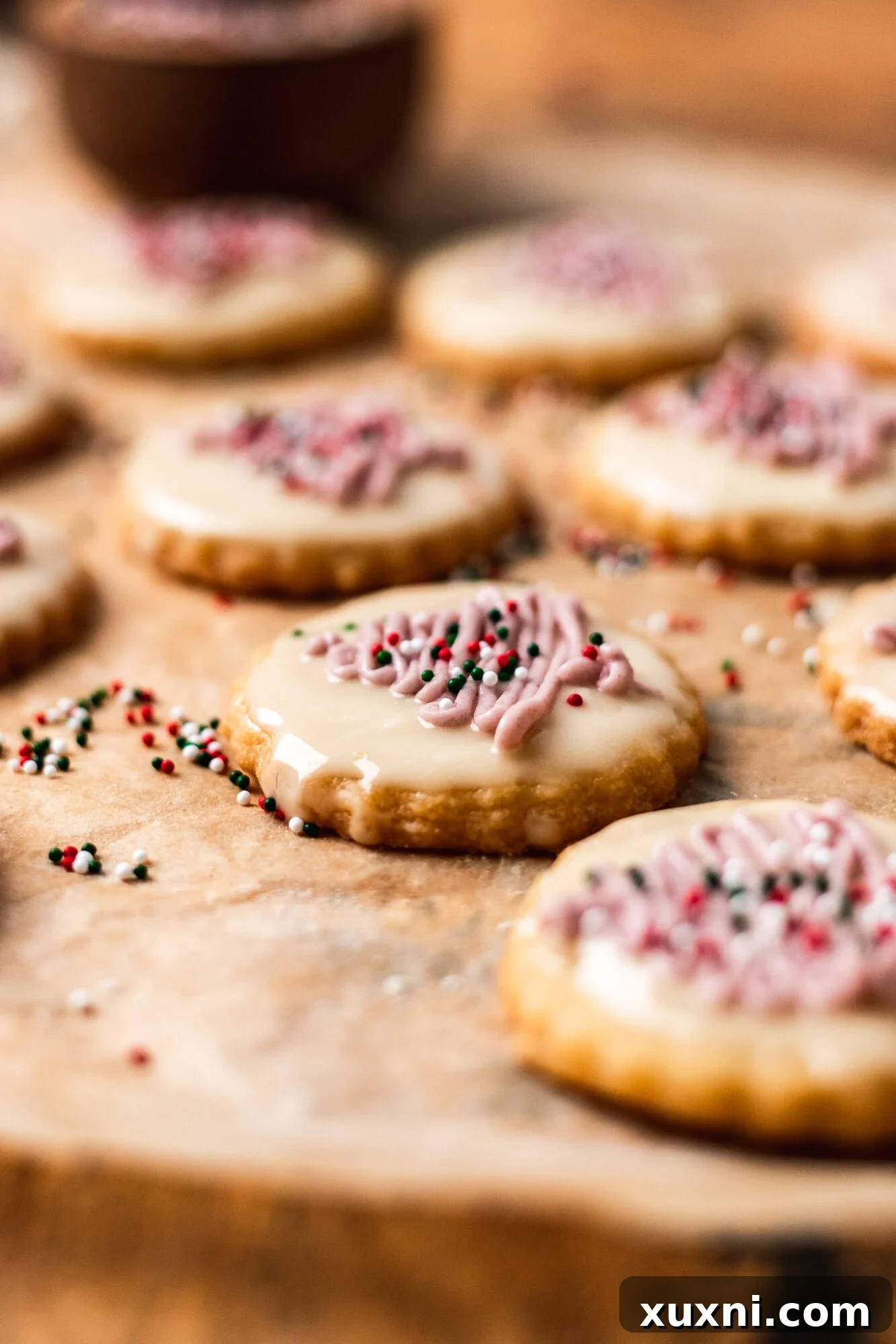 Perfectly baked vegan Christmas shortbread cookies on parchment paper