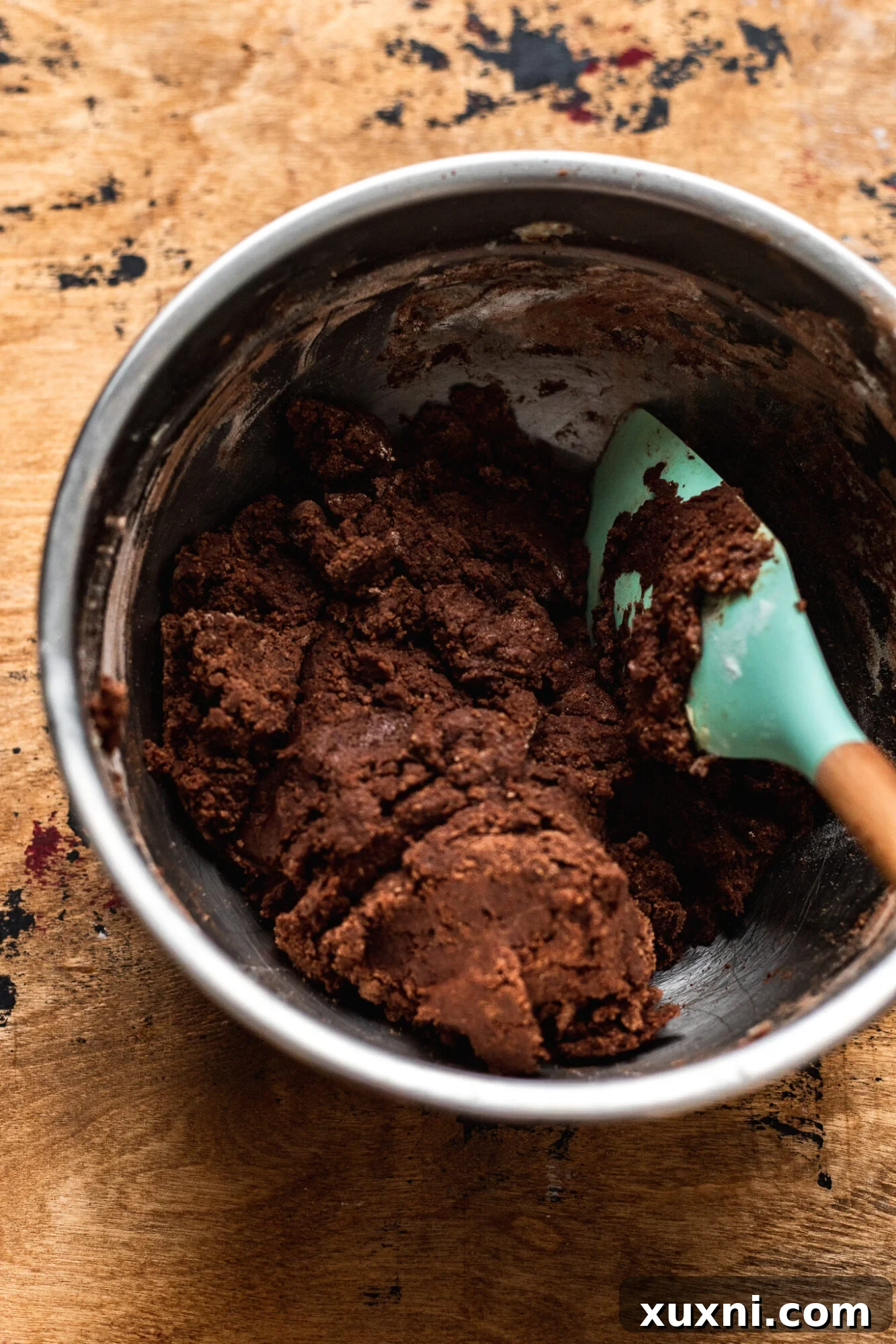 Mixing vegan chocolate thumbprint cookie dough ingredients
